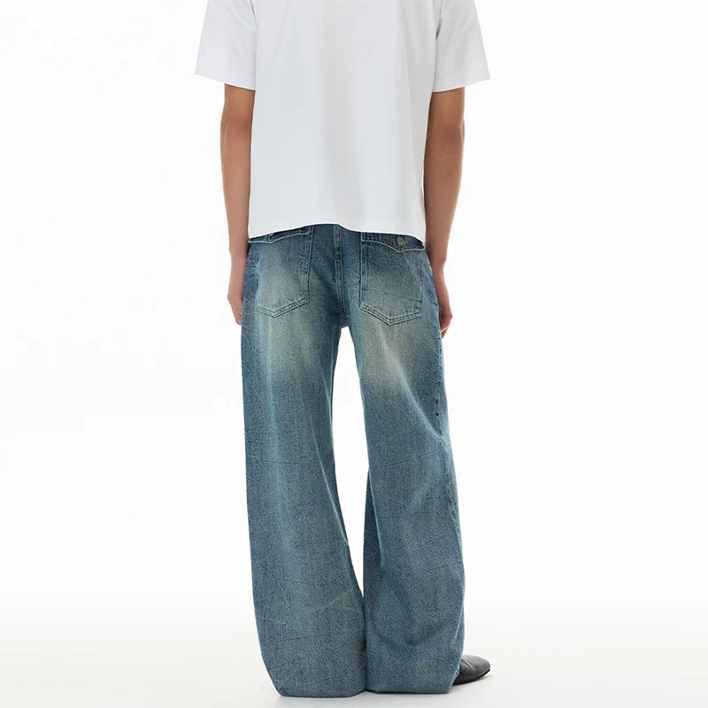 Herren Ultraweit geschnittene Denim-Baggy-Jeans mit markanten Whisker-Akzenten und bodenlangem Saum Drune