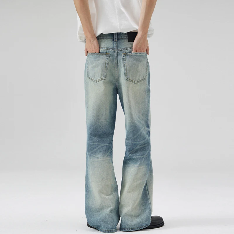 Herren Tiefsitzende Fließende Denim‑Schlaghose mit verlängertem Saum und Used‑Finish Drune