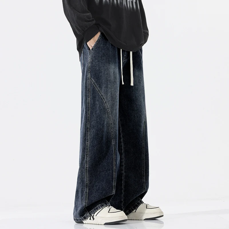 Herren Skulpturale Baggy-Denimhose mit tiefem Schritt und abgerundetem Saum Drune
