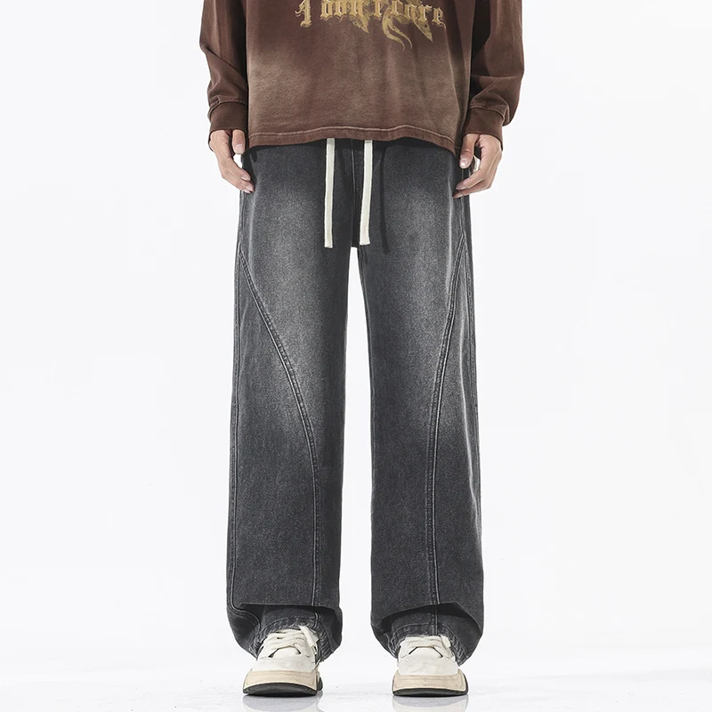 Herren Skulpturale Baggy-Denimhose mit tiefem Schritt und abgerundetem Saum Drune