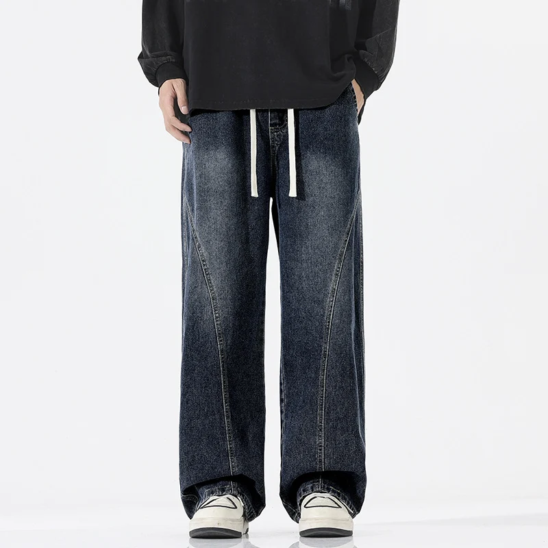 Herren Skulpturale Baggy-Denimhose mit tiefem Schritt und abgerundetem Saum Drune