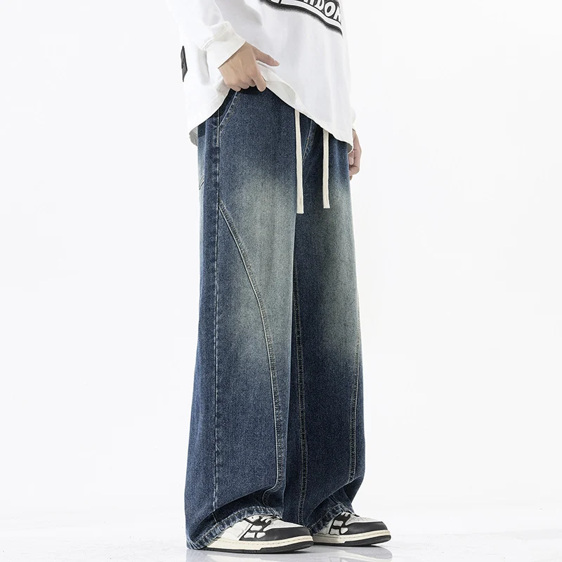 Herren Skulpturale Baggy-Denimhose mit tiefem Schritt und abgerundetem Saum Drune