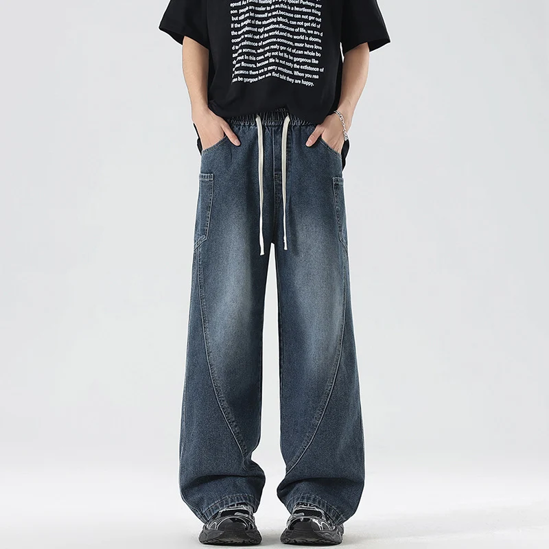Herren Extraweite Denim-Baggyhose mit Tunnelzugbund und Paneelnähten Drune