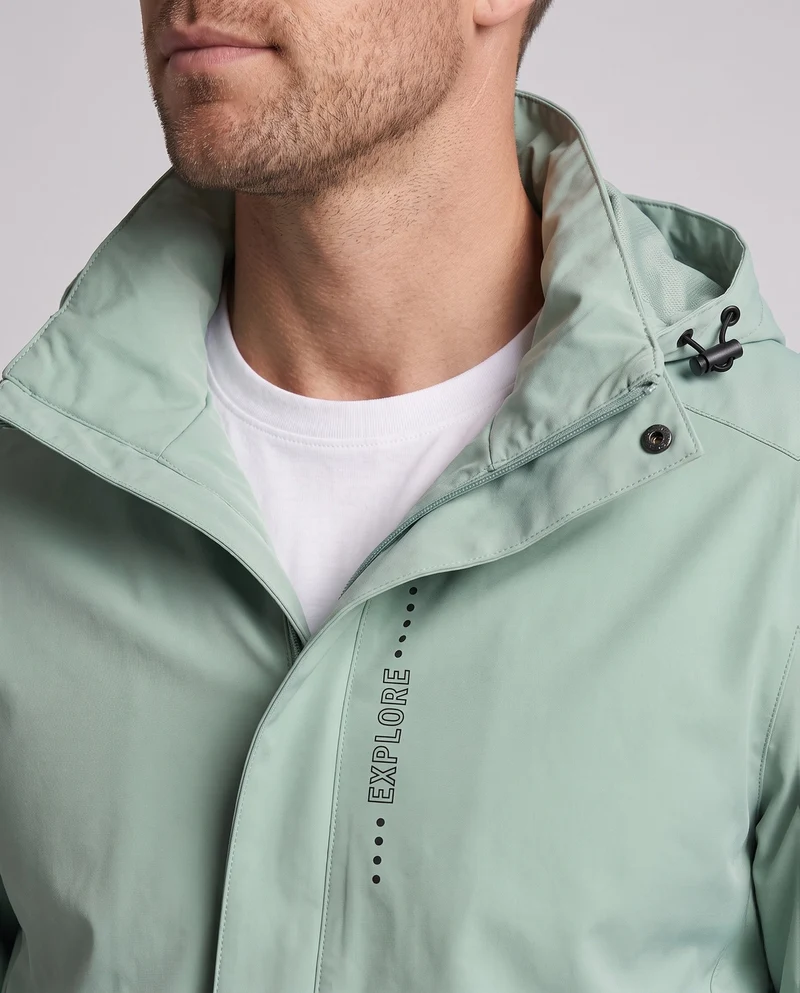 Herren Atmungsaktive Softshell Funktionsjacke mit verstaubarem Kapuze und Klettverschlussärmeln Drune