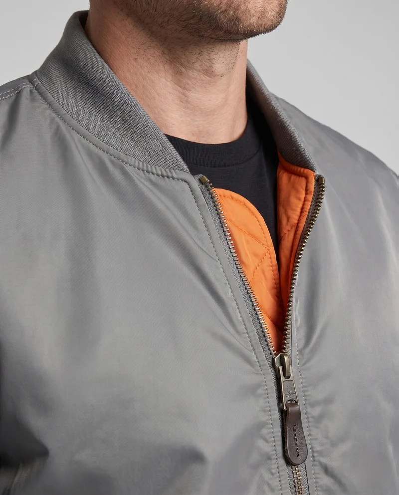 Herren Bomberjacke im Aviator-Stil mit kontrastierendem Innenfutter und Ärmtasche Drune
