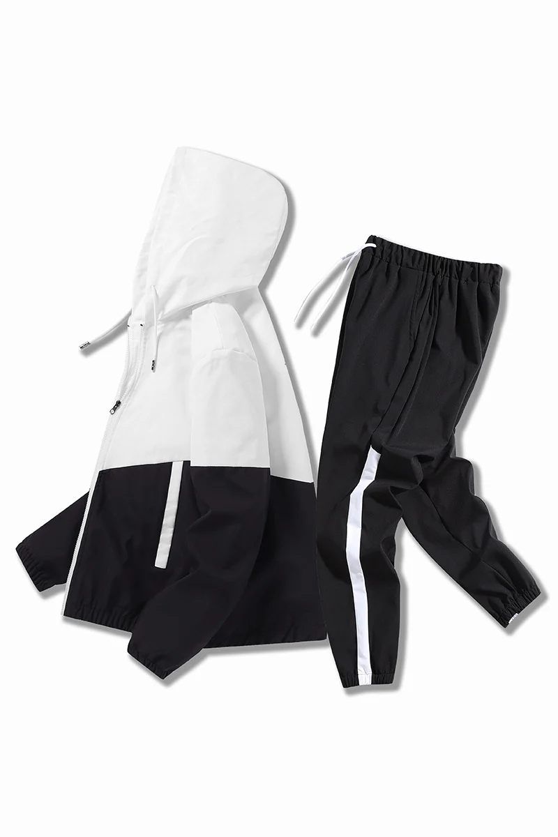 Herren Leichtes Colorblock-Trackset mit Kapuzen‑Windjacke und konischer Jogginghose Drune