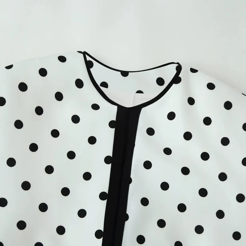 Damen Kurzblazer im Polka-Dot-Design mit Rundhalsausschnitt, kurzem Schnitt und Kontrastpaspeln Drune