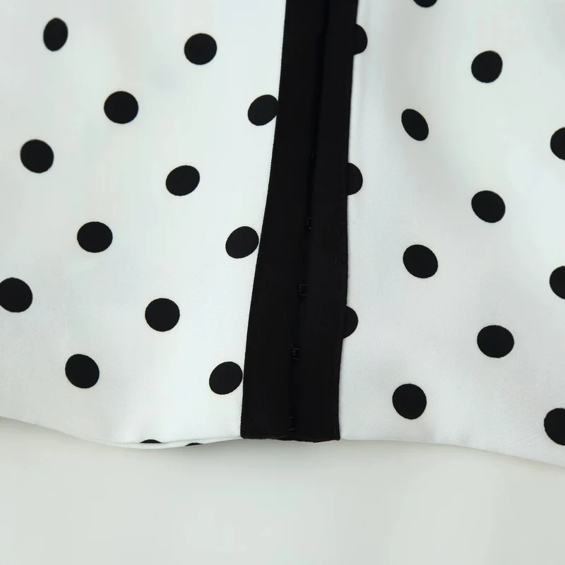 Damen Kurzblazer im Polka-Dot-Design mit Rundhalsausschnitt, kurzem Schnitt und Kontrastpaspeln Drune