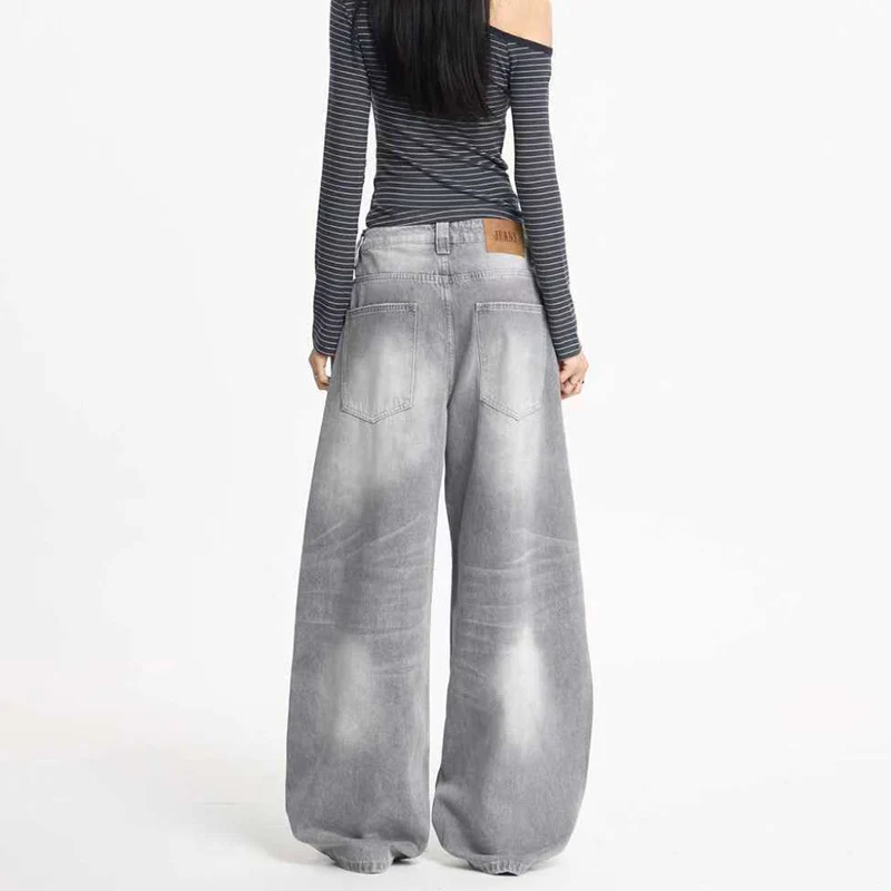 Damen Ultraweite Bodenlange Denim-Palazzohose mit tiefem Schritt und Vintage-Fade Drune